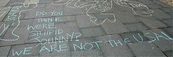 Sidewalk chalk in Sydney: Fallujah support rally.  Photo by zem from vigilant.tv